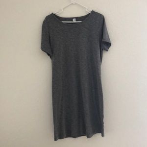 Short sleeve grey dress. Form fitting.